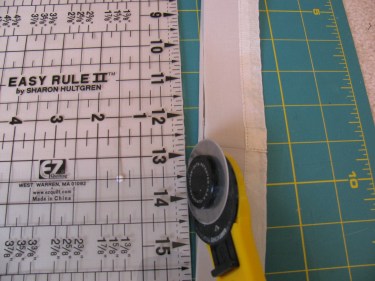 actual trimming off edge of hem with a rotary cutter, 057