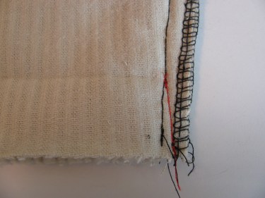 red line showing how to stitch to increase hem for tapered pants, 186