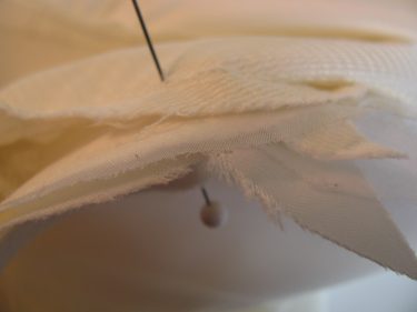 poking pin through 3 layers of halter top dress, 203