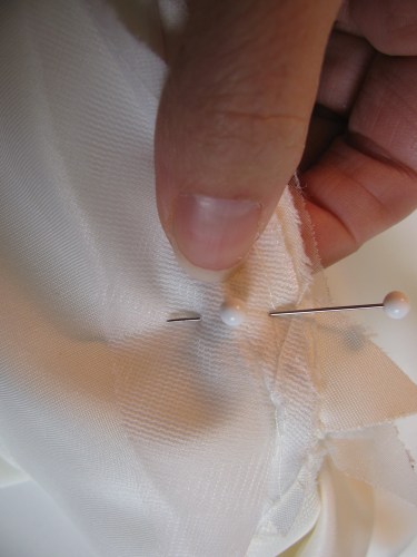 vertical pin to hold all the layers together, 204