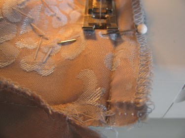 sewing the new seamline while taking in the bust of a dress, blue brocade, sewing blog 235