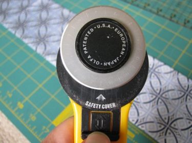 roatry cutter with the blade open, 293