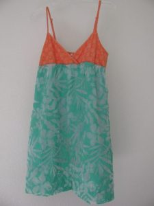 orange and teal dress for serged hem, 305