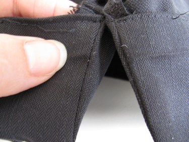 close up of vent on hem of pants, 538