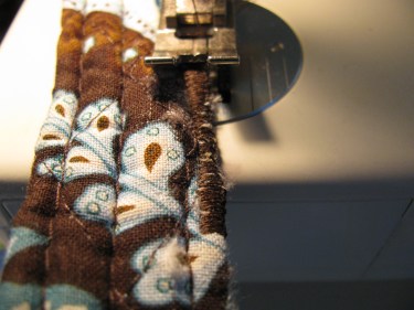 stitching to fix what the dog chewed up, 593