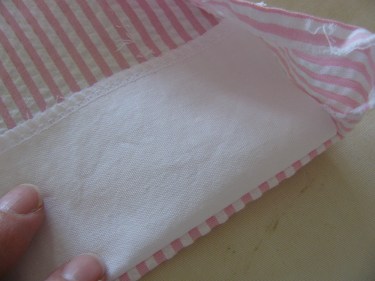 facing tucked into hem, zippered to buttoned, 371