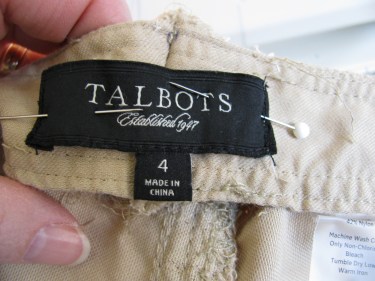 stitching the labels back on the waist, 745
