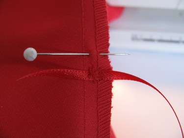 ribbon stitched in for red dress bustle, 764