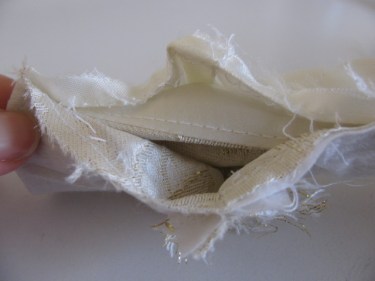 removed stitches on wide shoulder strap and looking inside the strap area