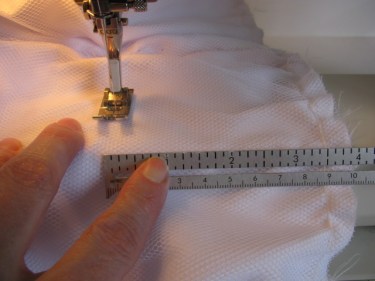 bar tacking the bubble dress hem, 948