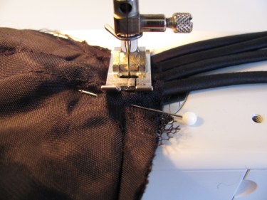stitching spaghetti straps in place before I cut off excess
