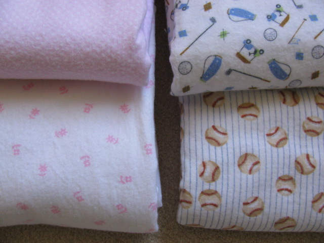 four baby blankets folded up and finished, 1032