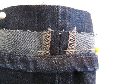 pin the "circle" of hem to the jeans farther up the pant leg