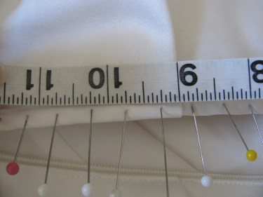 pins every half inch for putting in satin covered buttons