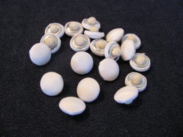 a pile of satin covered buttons sewing blog 1294