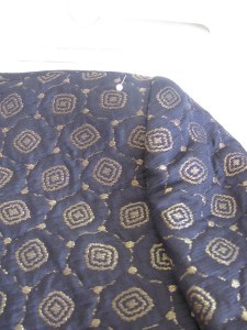 Altering the shoulders on a jacket close up of the shoulder