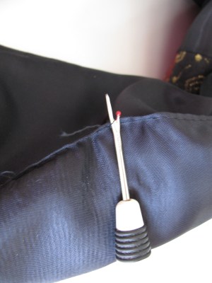 Unsew the lining seam of the English jacket