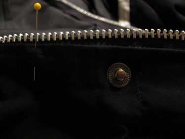 zipper teeth above snap on jacket, 1419