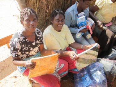 group of mamas getting gifts, 1551