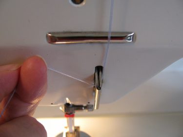 threading your machine with two threads for double needle, 1436