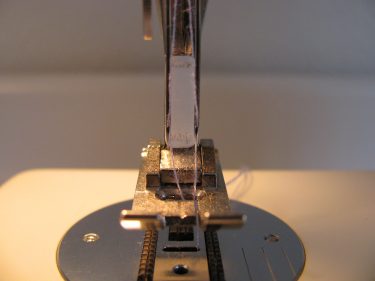 up close of twin needle threaded with 2 threads, 1437