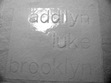 stenciled names on pillow