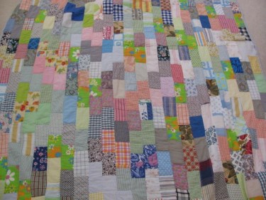 the full size photo of the vintage quilt with all its colorful fabrics, 8832