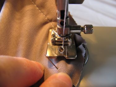 9356, stitch around the curve of a cushion with piping