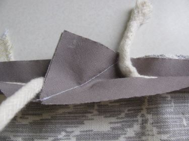 9379, stitch where the pins are to close up the piping